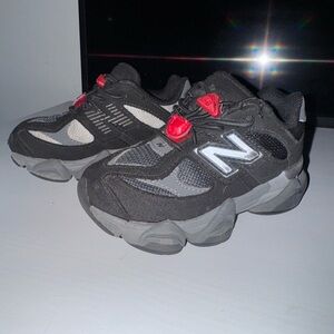 New Balance Kids Black and Gray Sneakers with Red Highlights